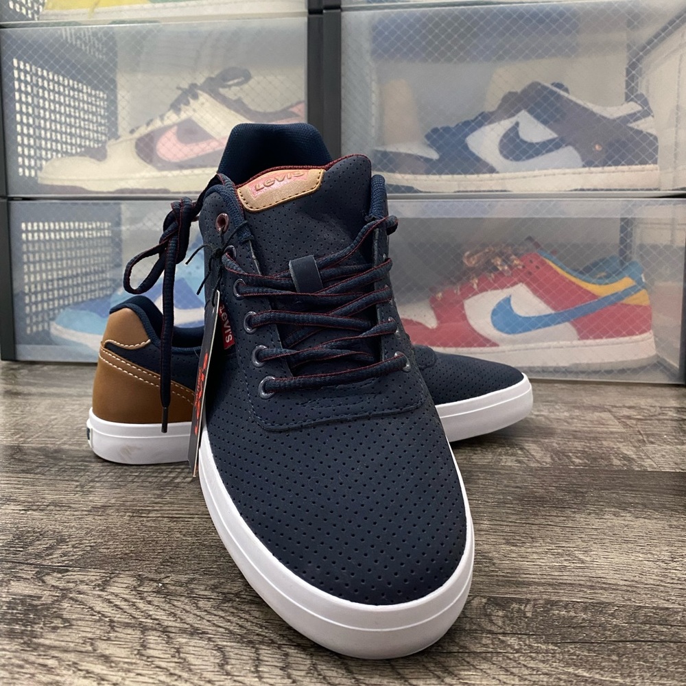 Levi’s Lace Up Low Top Perforated Navy with Brown accents. 
Model 519221U51